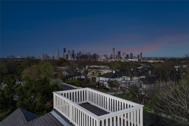 2124 Bluebonnet Ln, Austin, TX 78704 - deck at dusk featuring a view of skyline