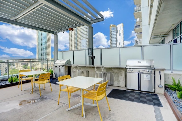 222 W Ave Unit 1213, Austin, TX 78701 - view of patio / terrace featuring a view of city and outdoor dining area