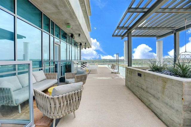 222 W Ave Unit 1213, Austin, TX 78701 - view of patio featuring an outdoor living space and a balcony