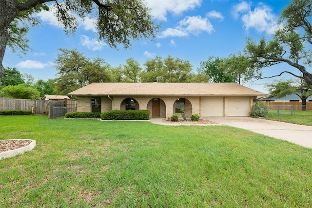 1304 Knollwood Cv, Round Rock, TX 78681 - ranch-style home featuring a garage and driveway
