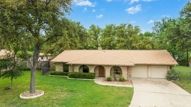 1304 Knollwood Cv, Round Rock, TX 78681 - ranch-style home with an attached garage, driveway, a shingled roof, and brick siding