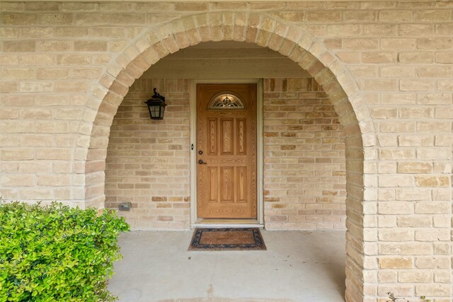 1304 Knollwood Cv, Round Rock, TX 78681 - property entrance featuring brick siding