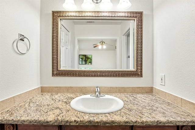 1304 Knollwood Cv, Round Rock, TX 78681 - bathroom featuring vanity and a ceiling fan