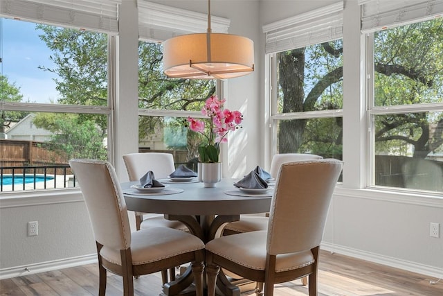 5621 Cypress Ranch Blvd, Spicewood, TX 78669 - dining area featuring baseboards and wood finished floors