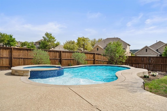 5621 Cypress Ranch Blvd, Spicewood, TX 78669 - view of pool with a pool with connected hot tub, a fenced backyard, and a patio area