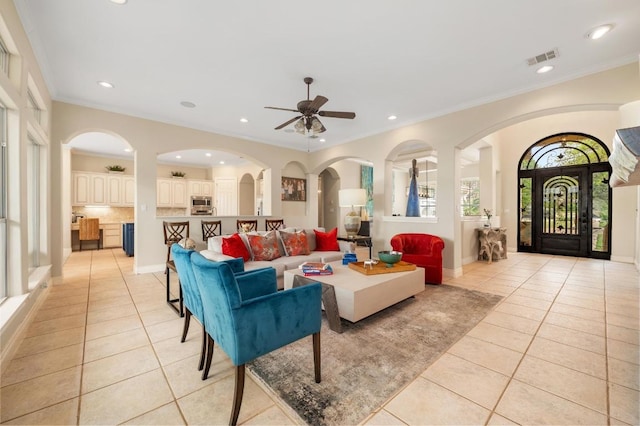 4321 Lakeway Blvd, Austin, TX 78734 - living room featuring light tile patterned floors, ceiling fan, recessed lighting, and crown molding