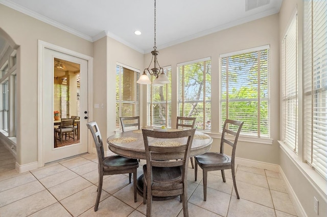4321 Lakeway Blvd, Austin, TX 78734 - dining area with light tile patterned floors, crown molding, and recessed lighting