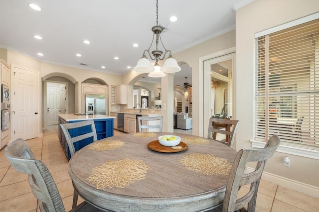 4321 Lakeway Blvd, Austin, TX 78734 - dining area with ornamental molding, light tile patterned flooring, arched walkways, recessed lighting, and a ceiling fan