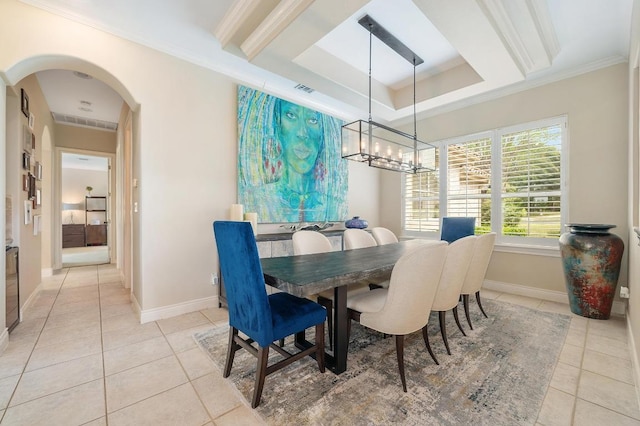 4321 Lakeway Blvd, Austin, TX 78734 - dining space featuring light tile patterned floors, arched walkways, crown molding, and a chandelier