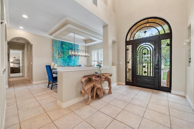 4321 Lakeway Blvd, Austin, TX 78734 - entrance foyer featuring light tile patterned flooring, arched walkways, and recessed lighting