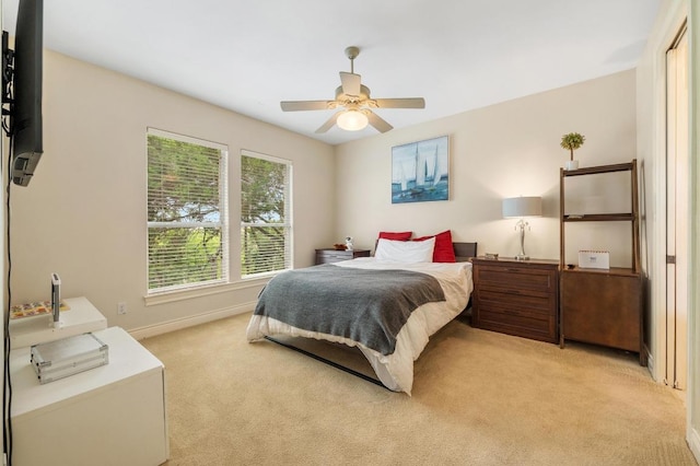 4321 Lakeway Blvd, Austin, TX 78734 - bedroom with light colored carpet and a ceiling fan