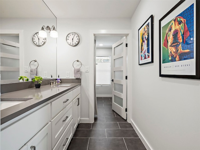 1004 Maufrais St, Austin, TX 78703 - bathroom with tile patterned floors and double vanity