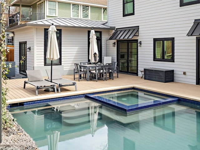 1004 Maufrais St, Austin, TX 78703 - view of swimming pool featuring a deck, a pool with connected hot tub, and outdoor dining space
