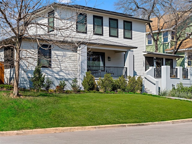 1004 Maufrais St, Austin, TX 78703 - view of front of home with a front lawn, a standing seam roof, and a metal roof