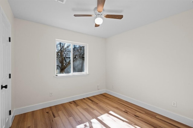 6303 Bexton Cir, Austin, TX 78745 - empty room featuring wood finished floors and a ceiling fan