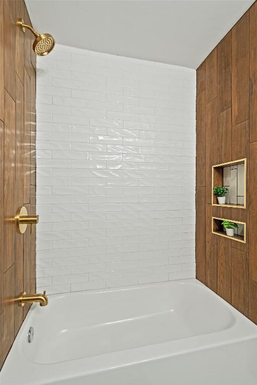6303 Bexton Cir, Austin, TX 78745 - bathroom featuring bathing tub / shower combination
