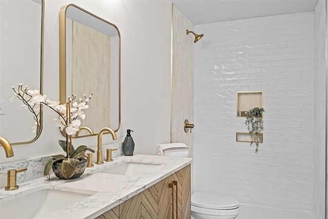 6303 Bexton Cir, Austin, TX 78745 - full bathroom with toilet, double vanity, and a shower