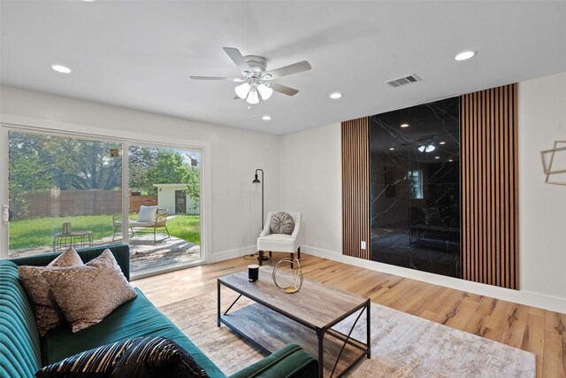 6303 Bexton Cir, Austin, TX 78745 - living area featuring a ceiling fan, recessed lighting, and wood finished floors