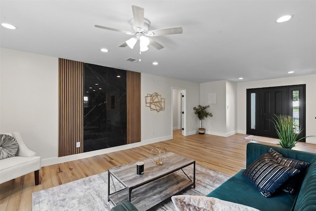6303 Bexton Cir, Austin, TX 78745 - living room featuring light wood-style floors, recessed lighting, ceiling fan, and baseboards
