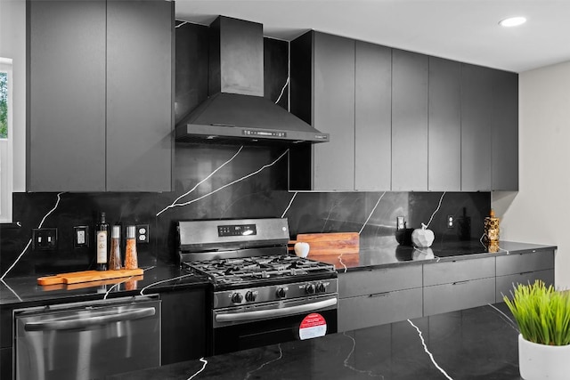 6303 Bexton Cir, Austin, TX 78745 - kitchen featuring appliances with stainless steel finishes, wall chimney range hood, modern cabinets, tasteful backsplash, and recessed lighting