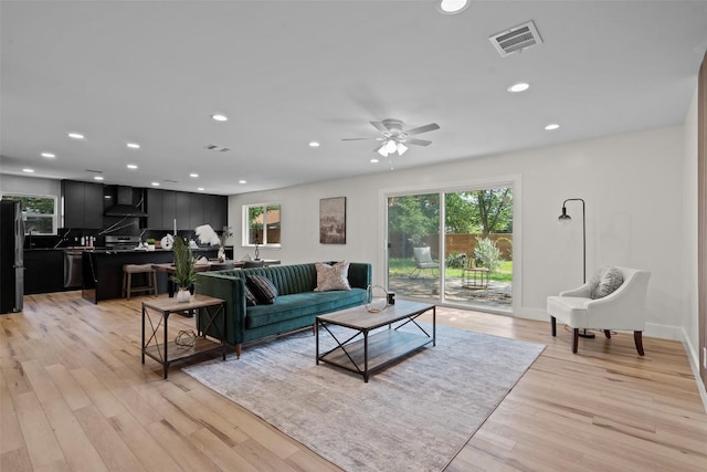 6303 Bexton Cir, Austin, TX 78745 - living area featuring recessed lighting, light wood finished floors, ceiling fan, and baseboards