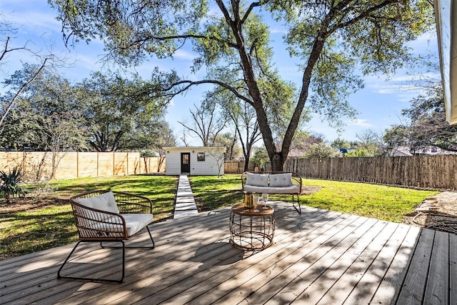 6303 Bexton Cir, Austin, TX 78745 - wooden terrace featuring a fenced backyard and a storage unit