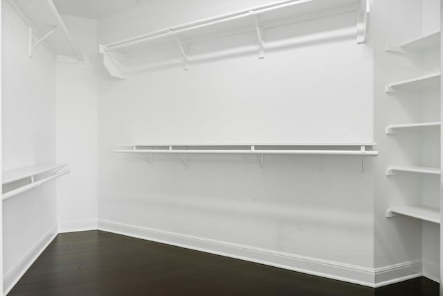 15408 Prestancia Dr, Austin, TX 78717 - spacious closet featuring dark wood-style flooring