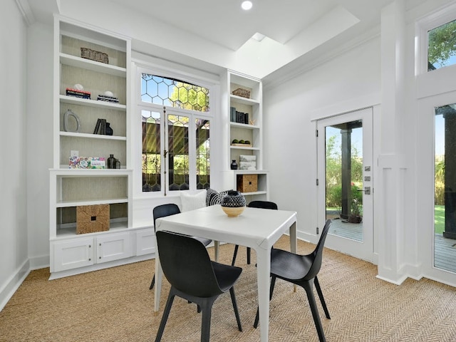 2610 Jefferson St, Austin, TX 78703 - dining space featuring healthy amount of natural light, built in features, and light carpet