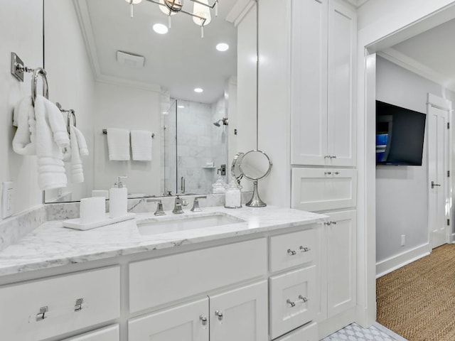 2610 Jefferson St, Austin, TX 78703 - full bathroom featuring a shower stall, crown molding, vanity, and recessed lighting