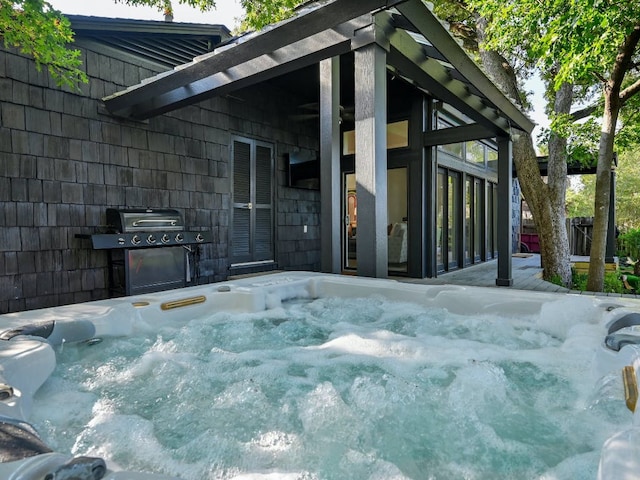 2610 Jefferson St, Austin, TX 78703 - view of patio with a hot tub and grilling area