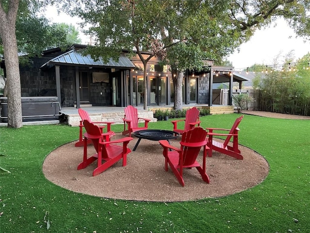2610 Jefferson St, Austin, TX 78703 - view of home's community with an outdoor fire pit, a patio area, and a hot tub
