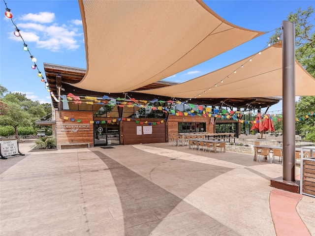 view of community featuring outdoor dry bar