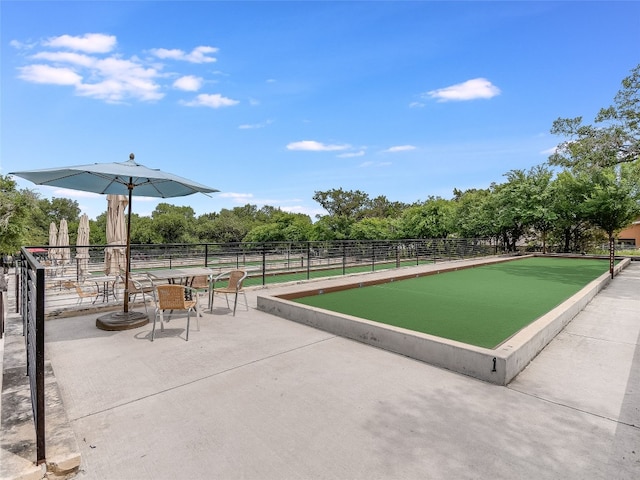 surrounding community featuring fence