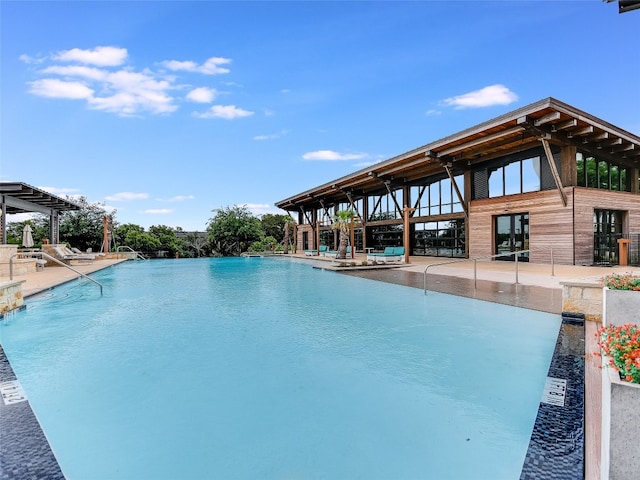 pool with a patio