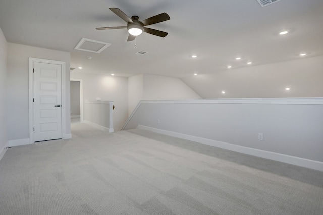 bonus room featuring a ceiling fan, recessed lighting, attic access, visible vents, and light carpet