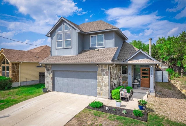 view of front of house with concrete driveway, an attached garage, stone siding, and roof with shingles