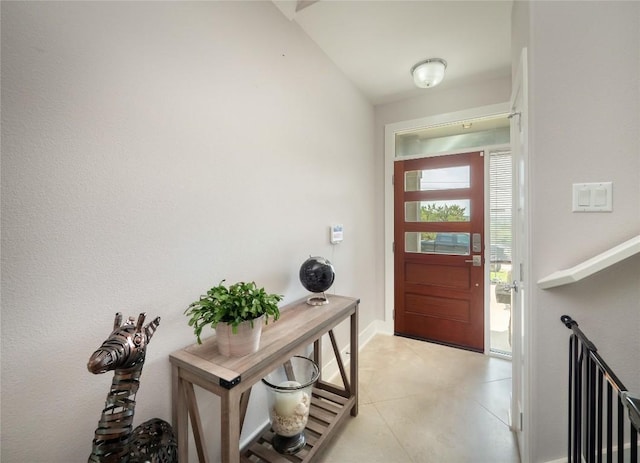 17504 Village Dr, Dripping Springs, TX 78620 - foyer with light tile patterned flooring and baseboards