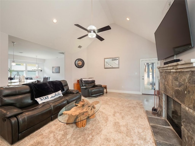 living area with baseboards, a fireplace, recessed lighting, high vaulted ceiling, and ceiling fan with notable chandelier