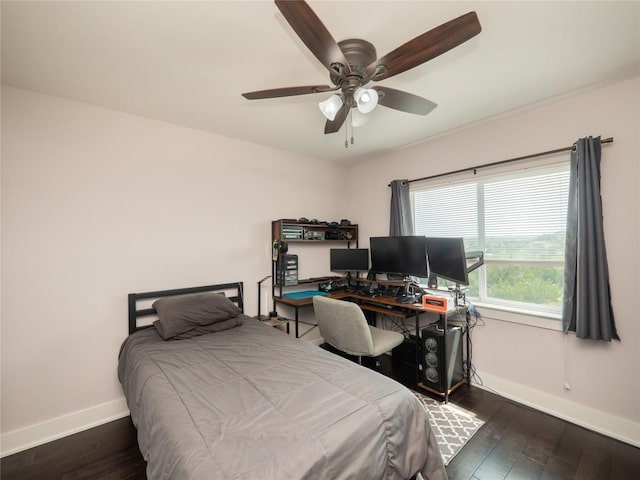 bedroom featuring hardwood / wood-style flooring, baseboards, and ceiling fan
