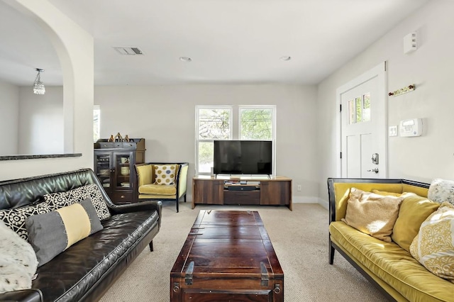 512 Bouldin Ave, Austin, TX 78704 - living room with light colored carpet and arched walkways