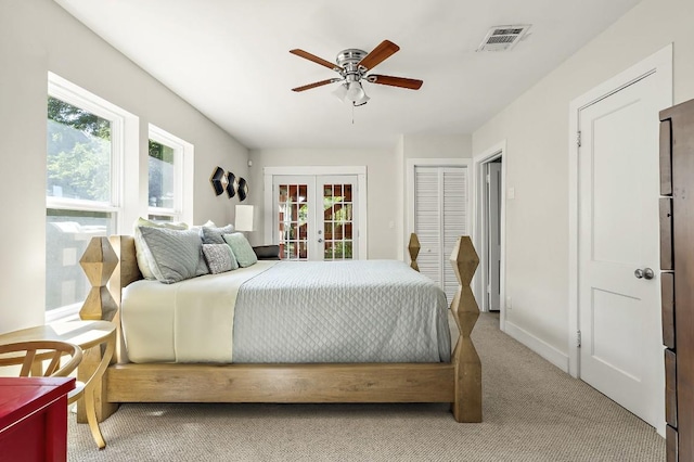 512 Bouldin Ave, Austin, TX 78704 - bedroom with french doors, carpet floors, and a ceiling fan