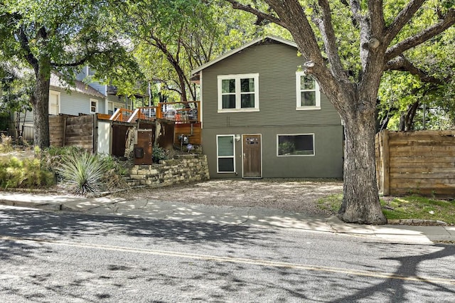 512 Bouldin Ave, Austin, TX 78704 - view of front of property featuring stucco siding and a deck
