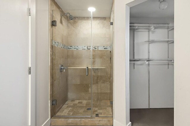 512 Bouldin Ave, Austin, TX 78704 - full bath with a shower stall and a spacious closet