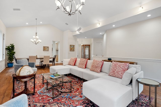 2305 Barton Creek Blvd Unit 36, Austin, TX 78735 - living area featuring a chandelier, wood finished floors, recessed lighting, baseboards, and high vaulted ceiling