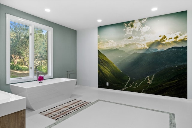 2305 Barton Creek Blvd Unit 36, Austin, TX 78735 - full bath with a freestanding tub, recessed lighting, vanity, and tile patterned floors