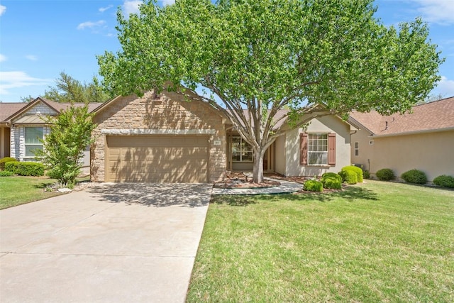 311 Dove Hollow Trl, Georgetown, TX 78633 - single story home with a garage, driveway, a front lawn, stucco siding, and stone siding