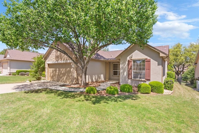 311 Dove Hollow Trl, Georgetown, TX 78633 - ranch-style house with concrete driveway, stucco siding, and a garage