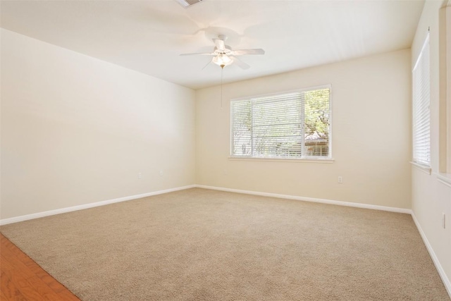 311 Dove Hollow Trl, Georgetown, TX 78633 - empty room with a ceiling fan, baseboards, and light colored carpet