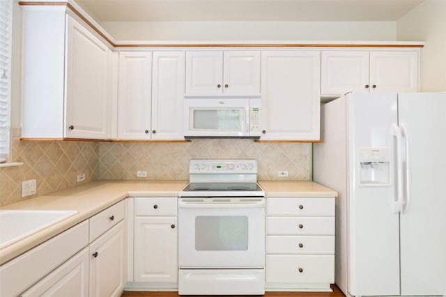 311 Dove Hollow Trl, Georgetown, TX 78633 - kitchen with white appliances, white cabinetry, tasteful backsplash, and light countertops
