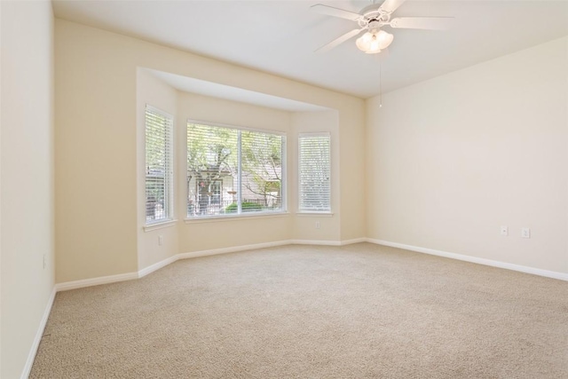 311 Dove Hollow Trl, Georgetown, TX 78633 - unfurnished room featuring carpet, baseboards, and a ceiling fan